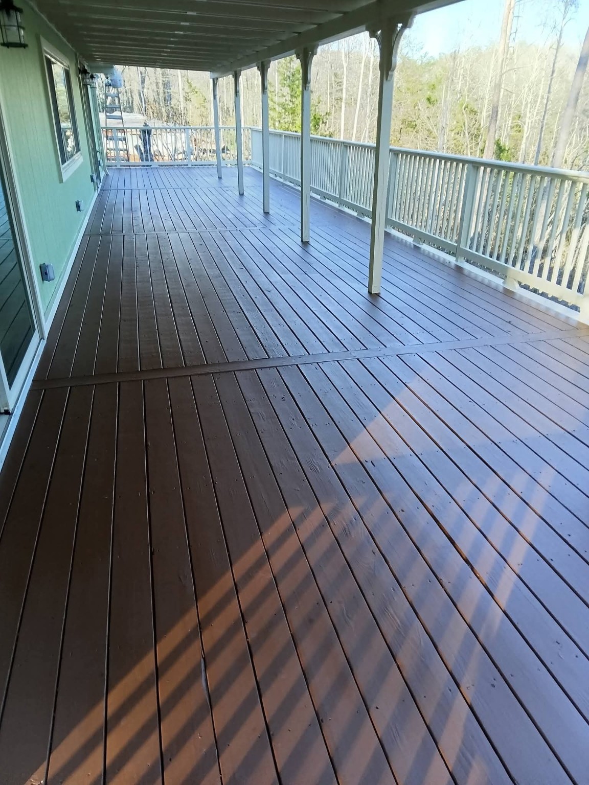 Dark stained covered deck